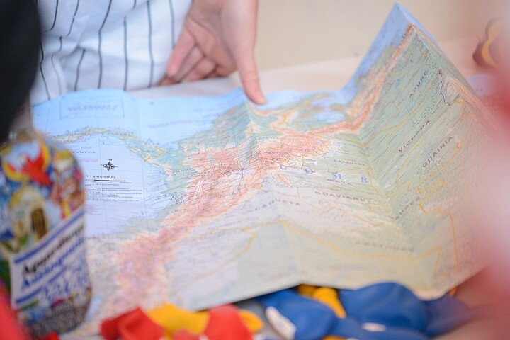 A map is spread out on a table.
